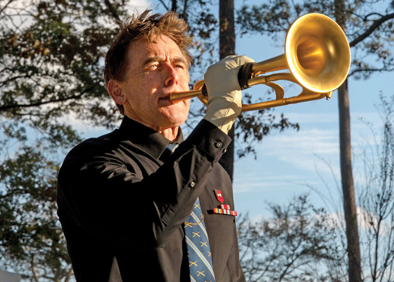 Photo of Lash Bragan playing the trumpet