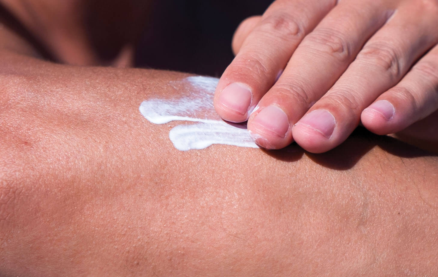 Photo of sunscreen on arm