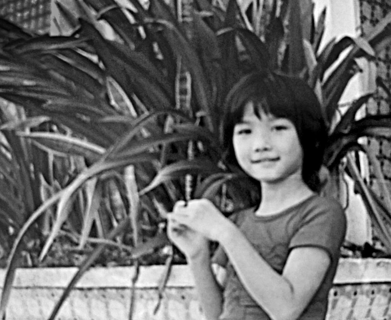 Black and white photo of young Cameron Truong