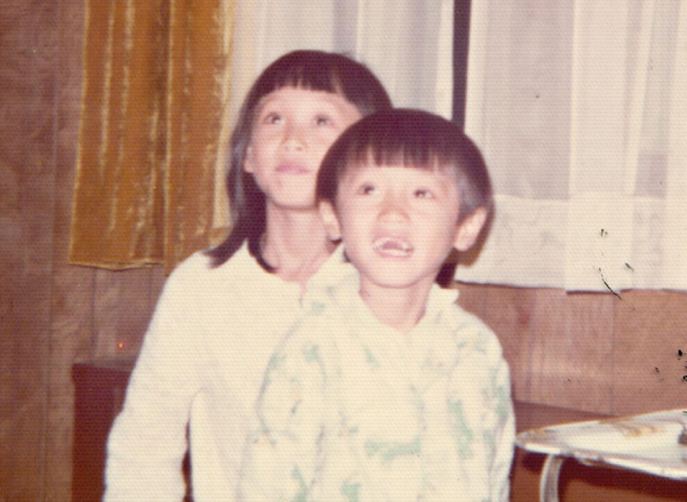 Old photo of Naja with her brother