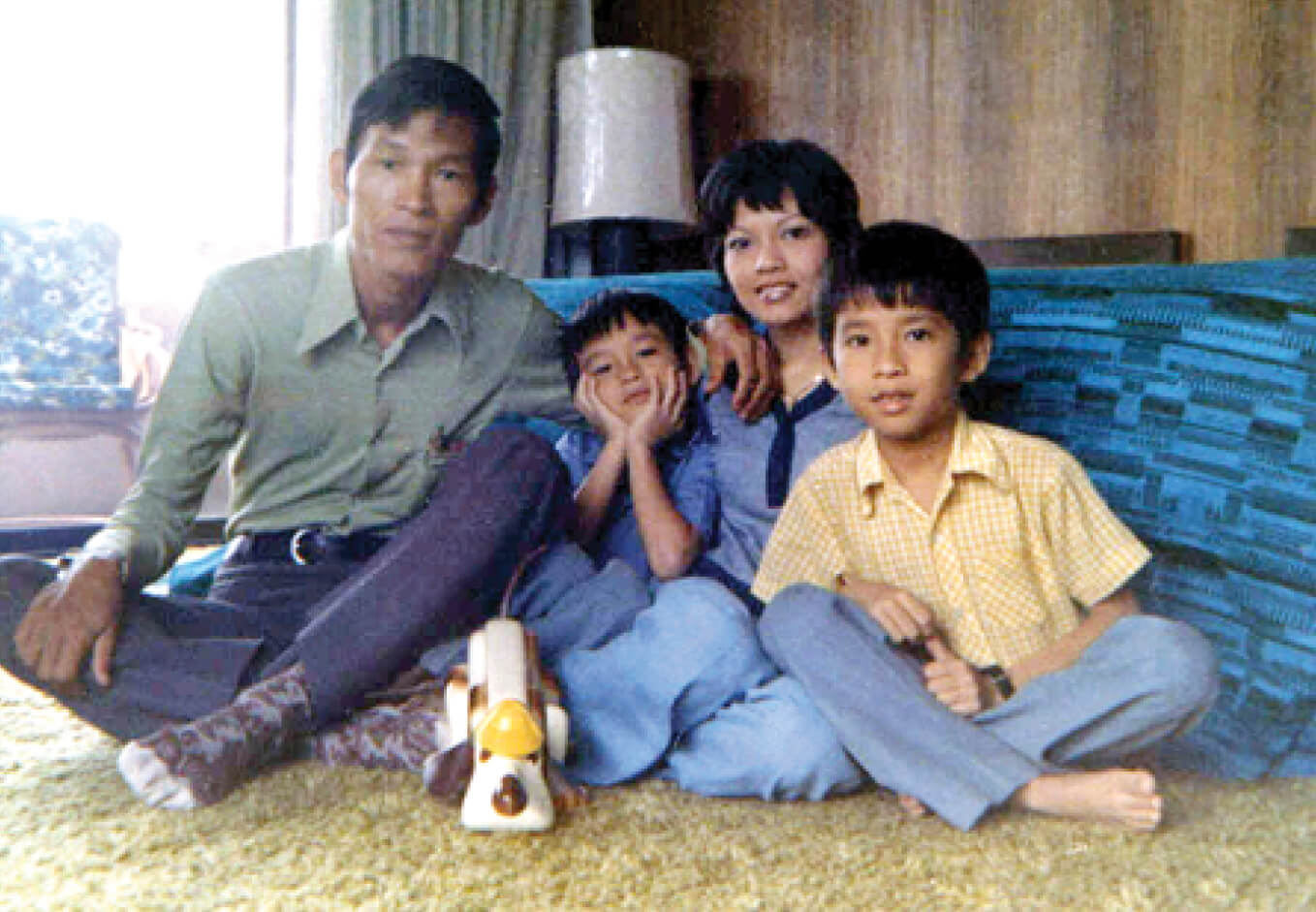 Photo of Hau with his family in Guam