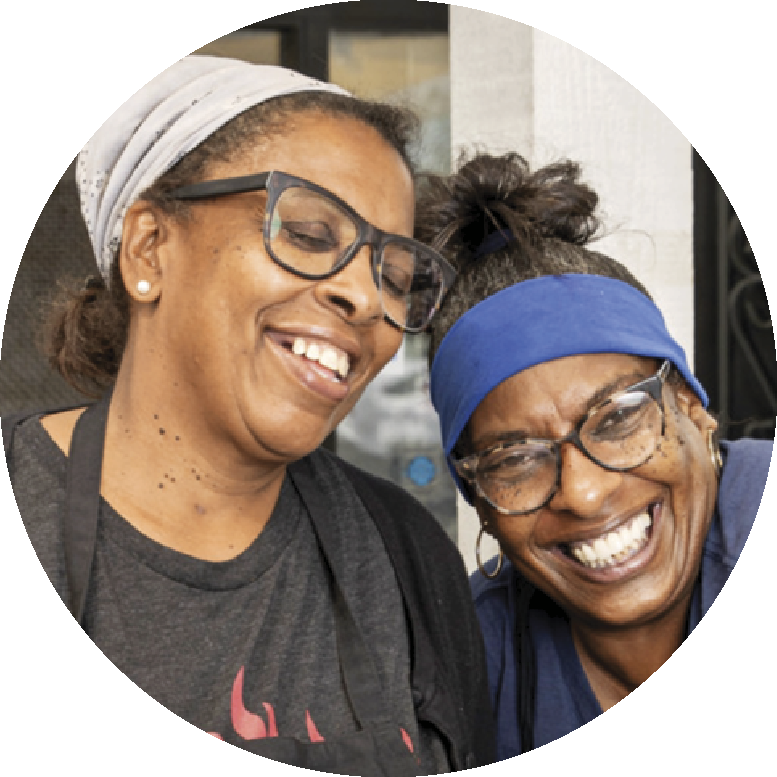 Photograph of the two sisters Deborah and Mary Jones laughing and having a good time 