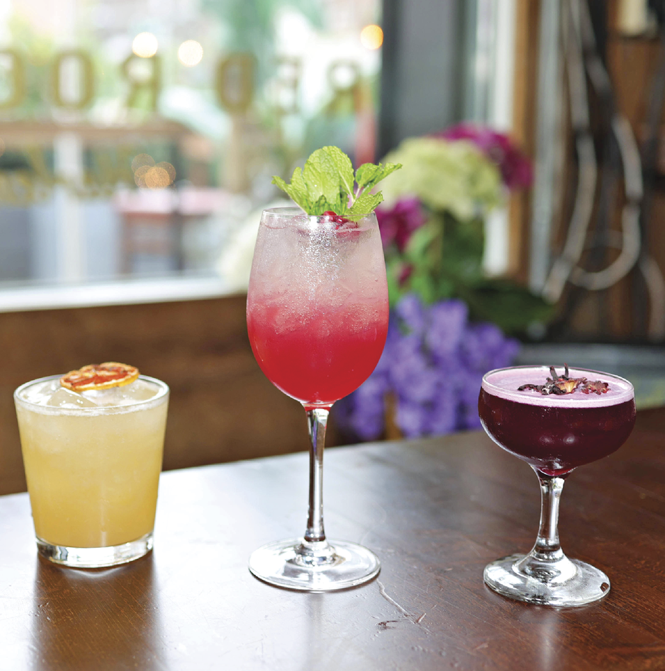 3 cocktails laid out on a table