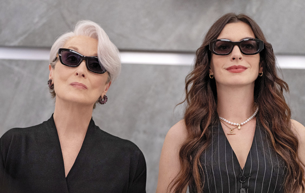 Image of Anna Hathway and Maryl Streep standing in the elevator