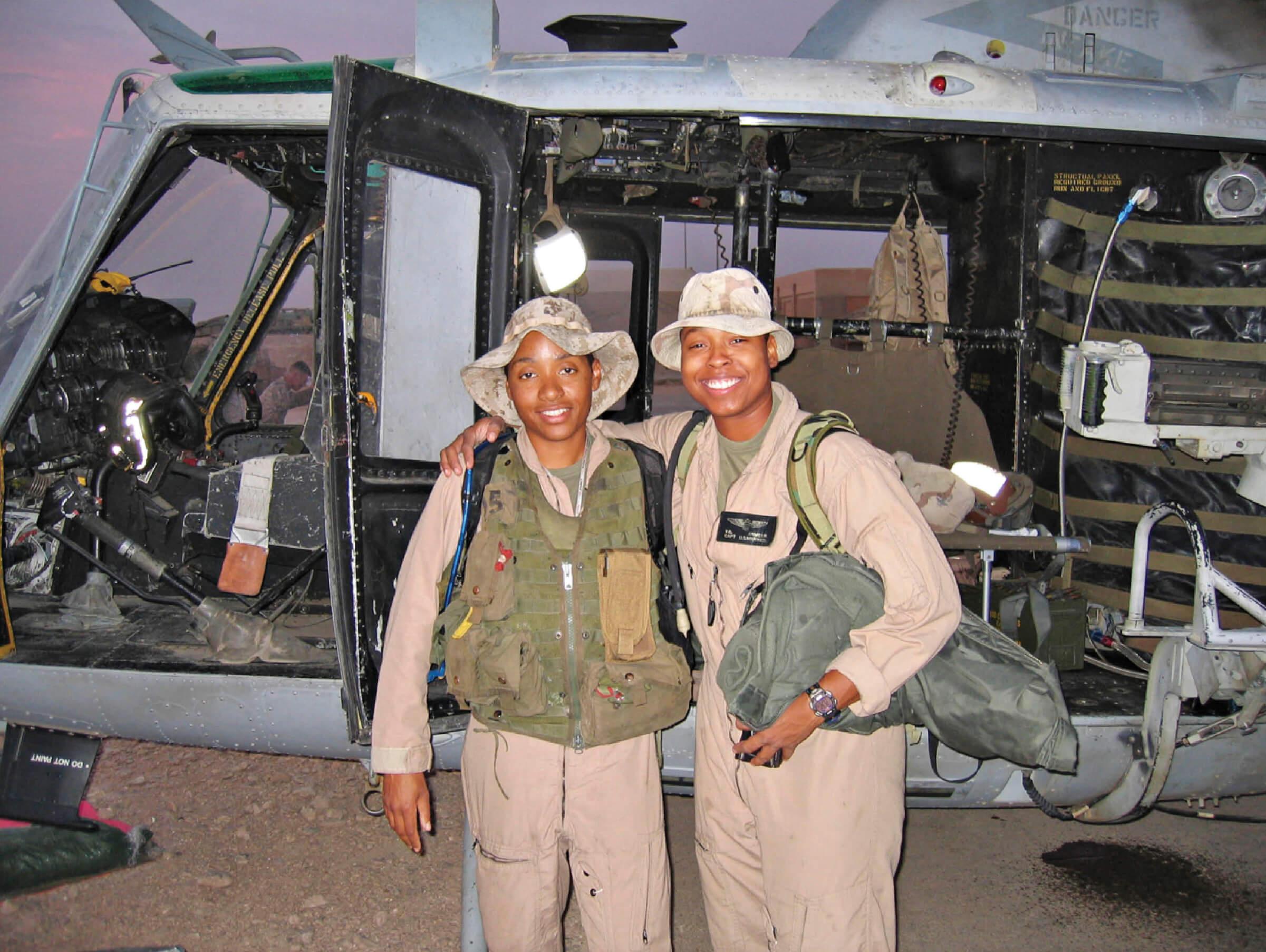 Photograph of Misca Geter and Vernice Armour talking during the Iraq War in 2004
