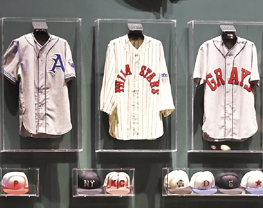 Photograph of three jerseys showcased at the Negro Leagues Baseball Museum