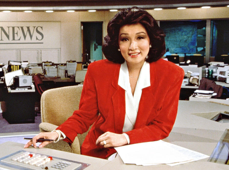 Portrait of Connie Chung at news anchor desk