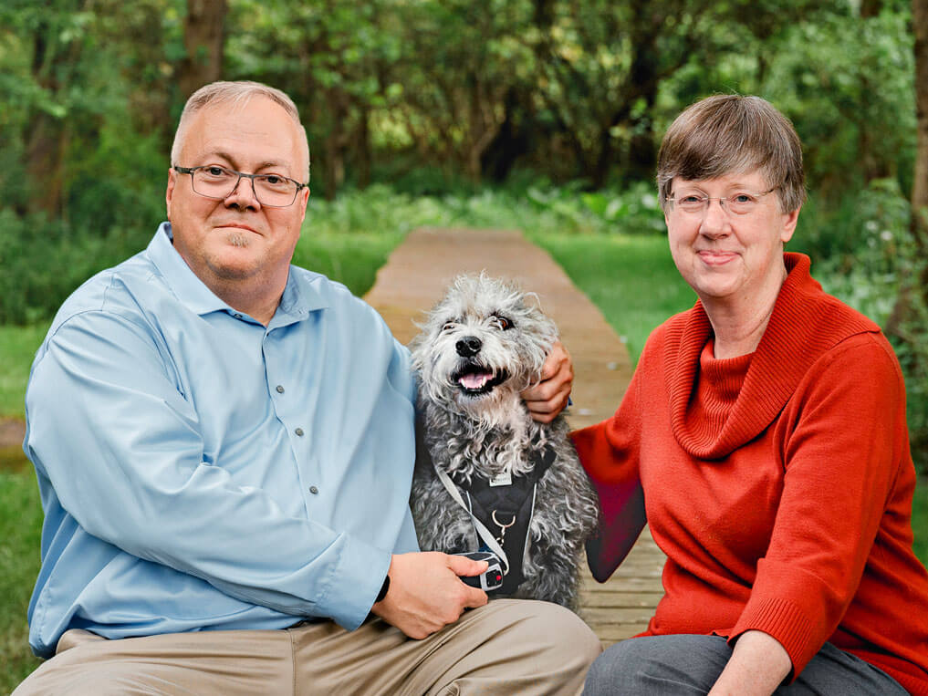 Photo portrait of The Burtches with their dog Jasper