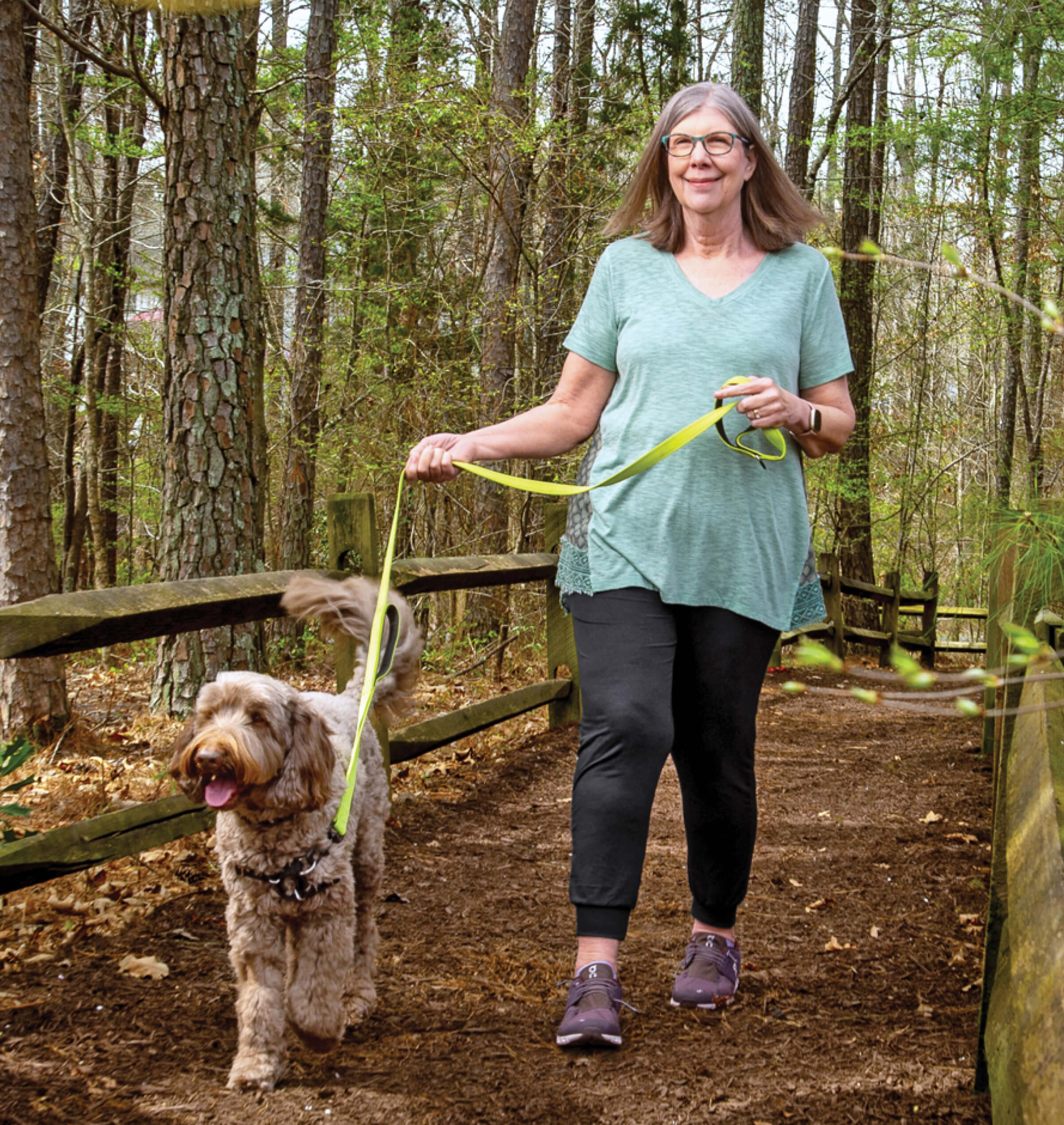 Photo of Angela Cheney walking her dog Loki