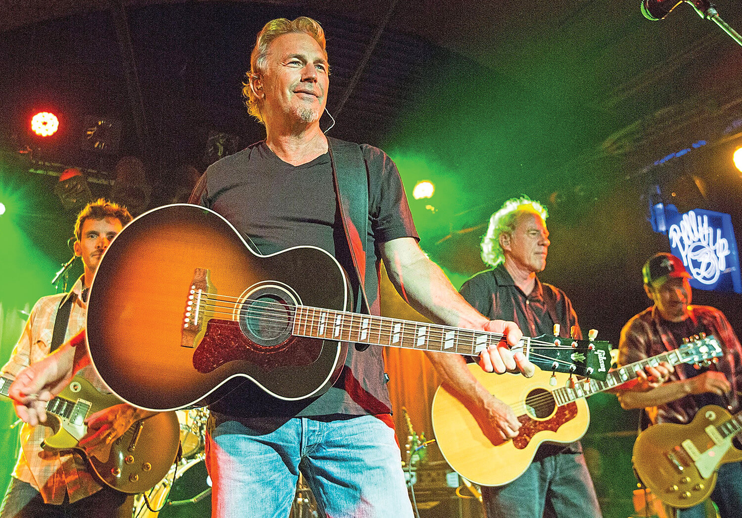 Photo of Costner's band at a live show