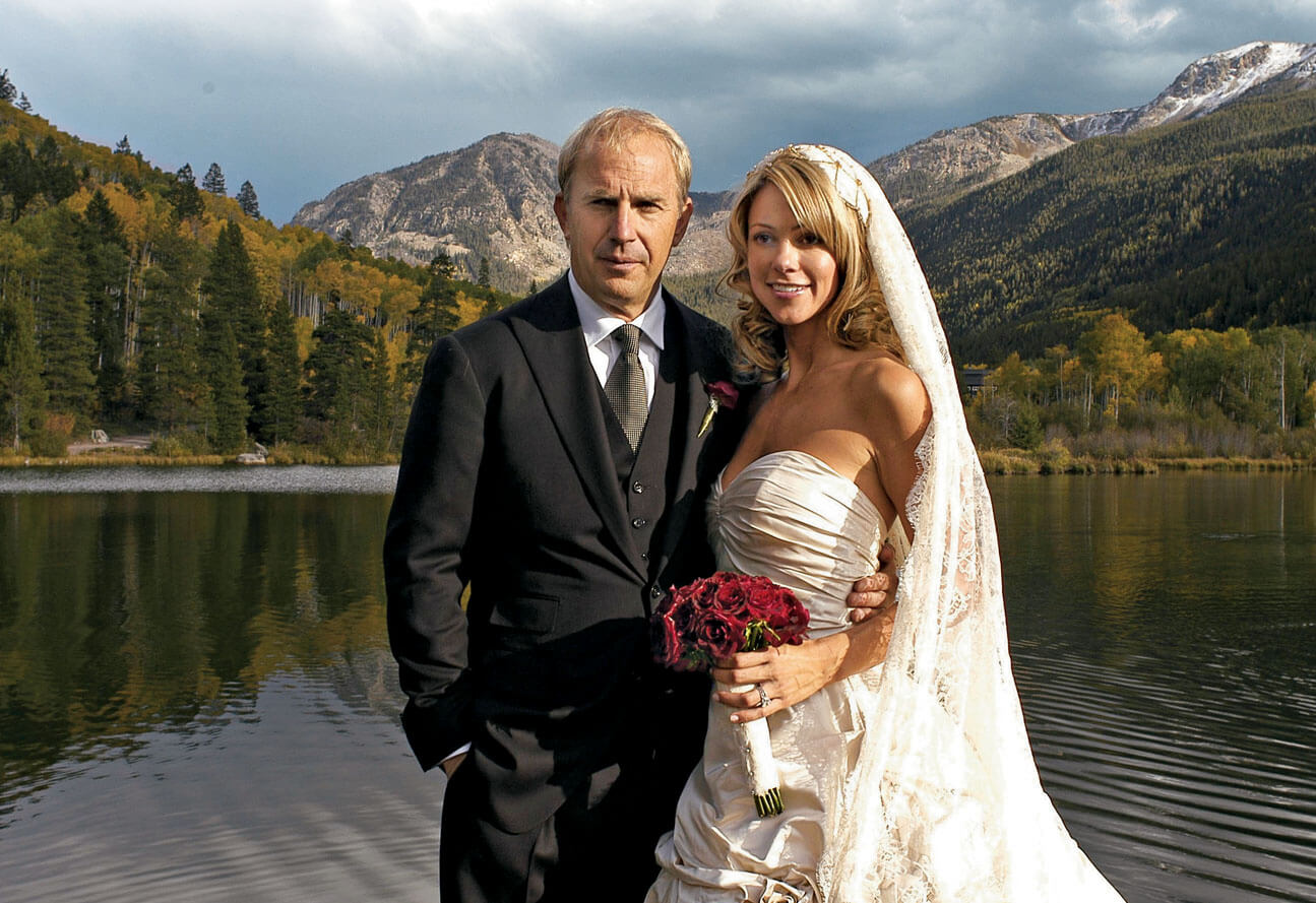 Photo of Kevin Costner and his wife Christine on their wedding day