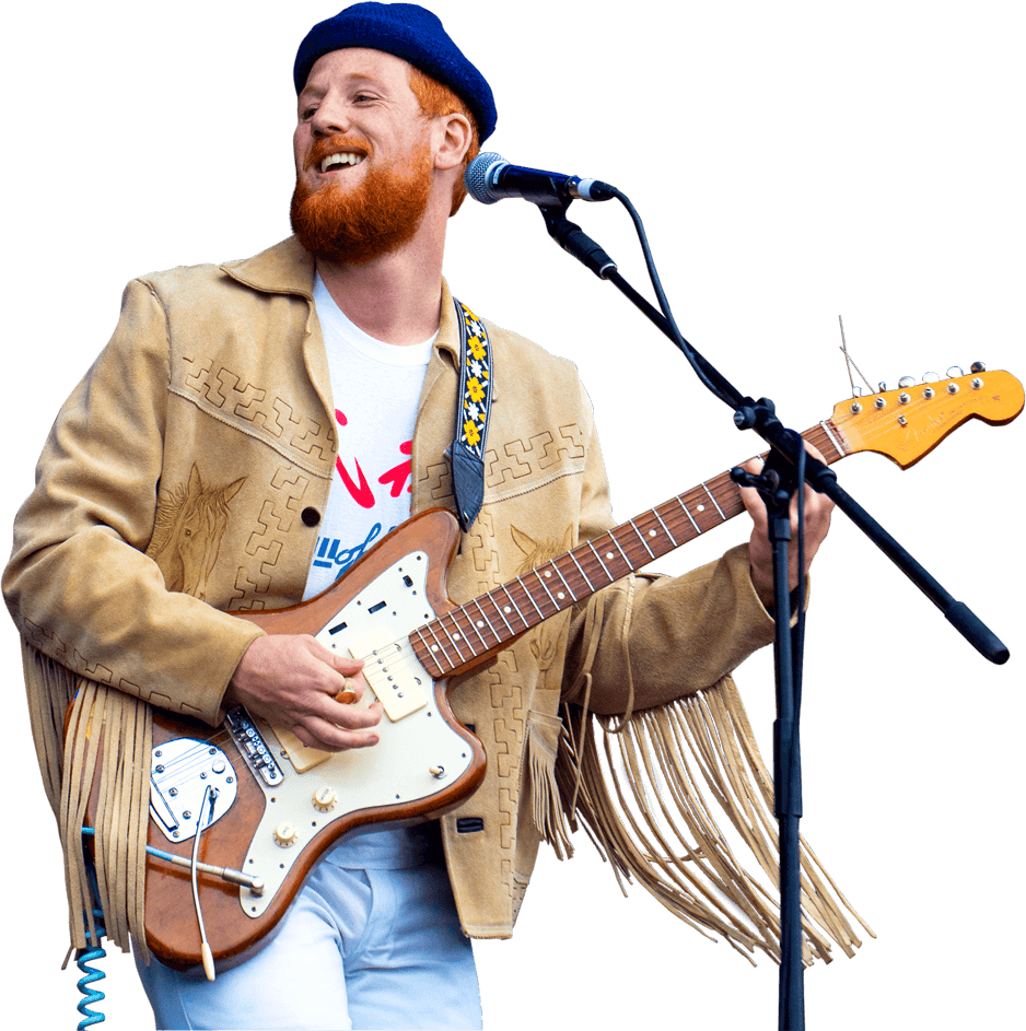 Photo of Willie J. Healey playing guitar