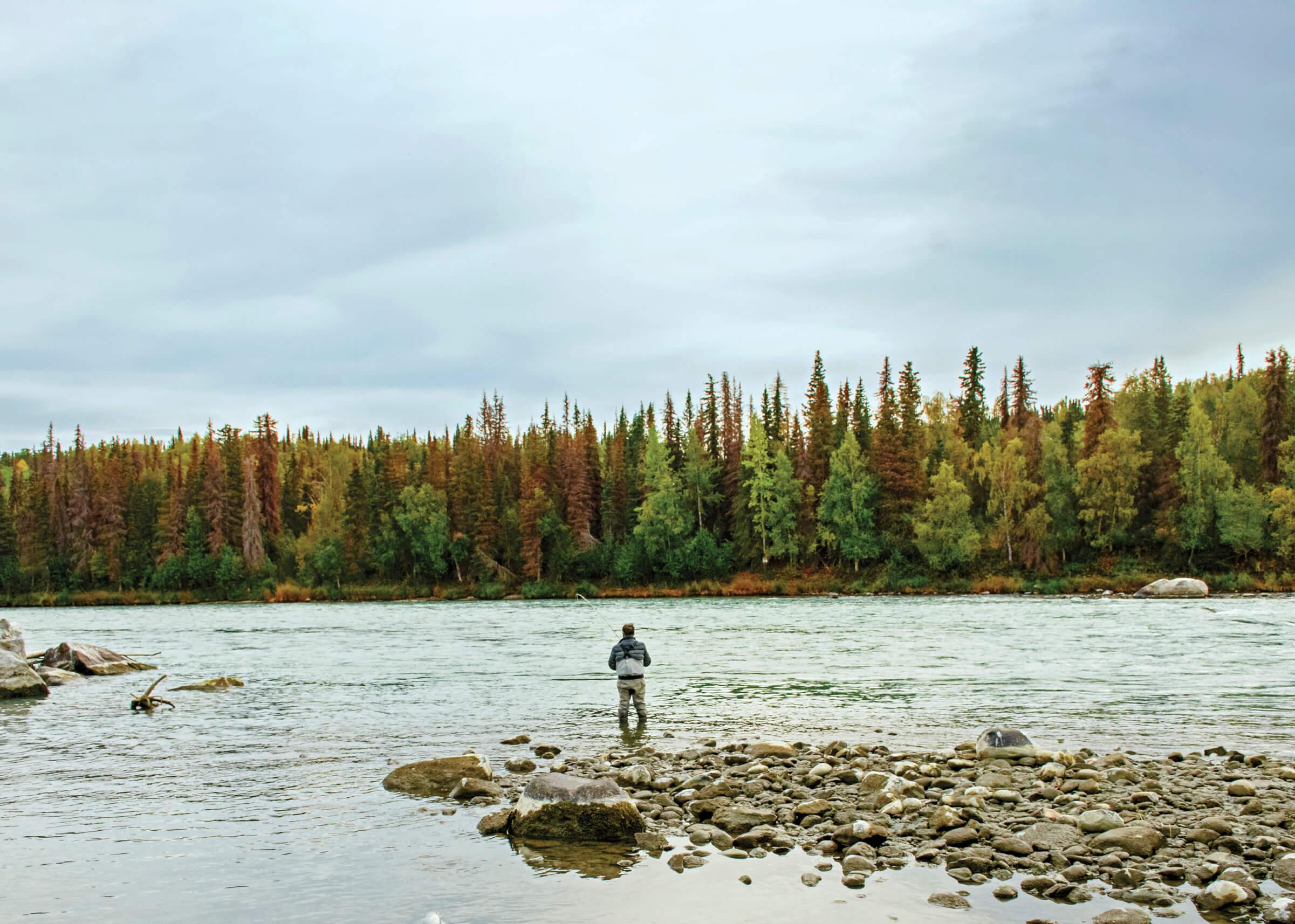 Photo of man fishing