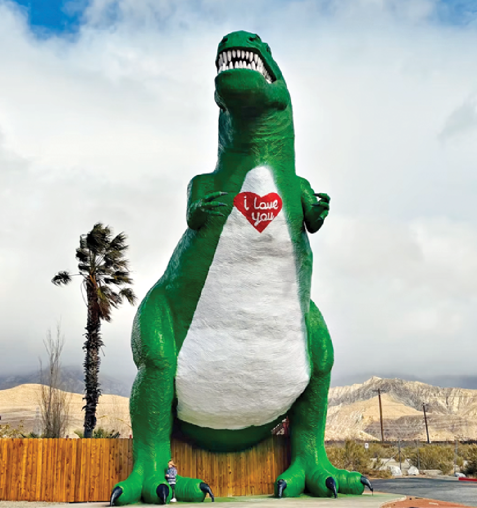 Photo of giant green T-rex statue