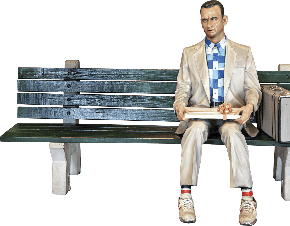 Statue of Tom Hanks from Forest Gump sitting on a bench 