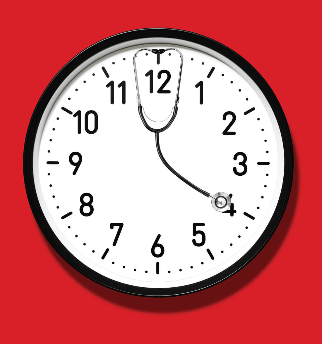 Photo illustration of a wall clock with a stethoscope showing the time as 4 o'clock