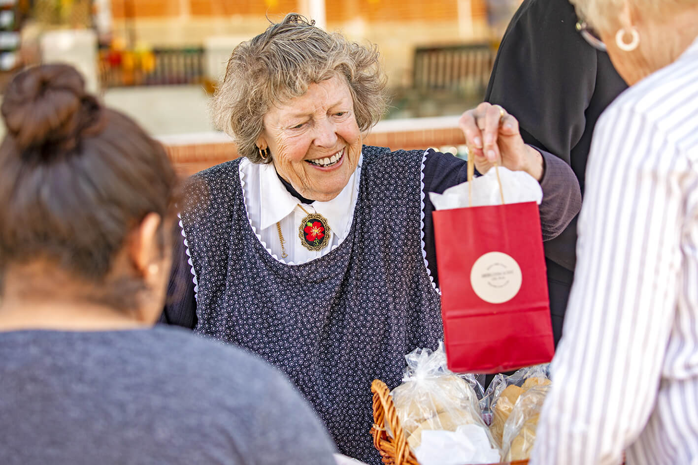 Photo of LaVonne Blok selling farm-grown items at a market