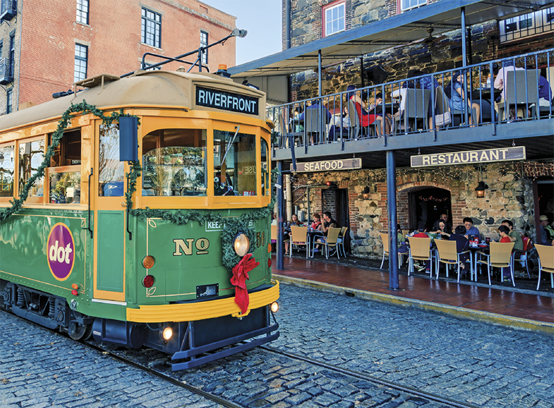 Photograph of a colorful tram running on the streets of Savannah, Georgia 