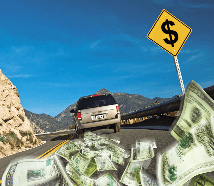 A image showing a highway winding through a sunny, mountainous, arid landscape. A single car with a yellow dollar sign symbol on its roof is driving away from the viewer leaving behind a trail of money 