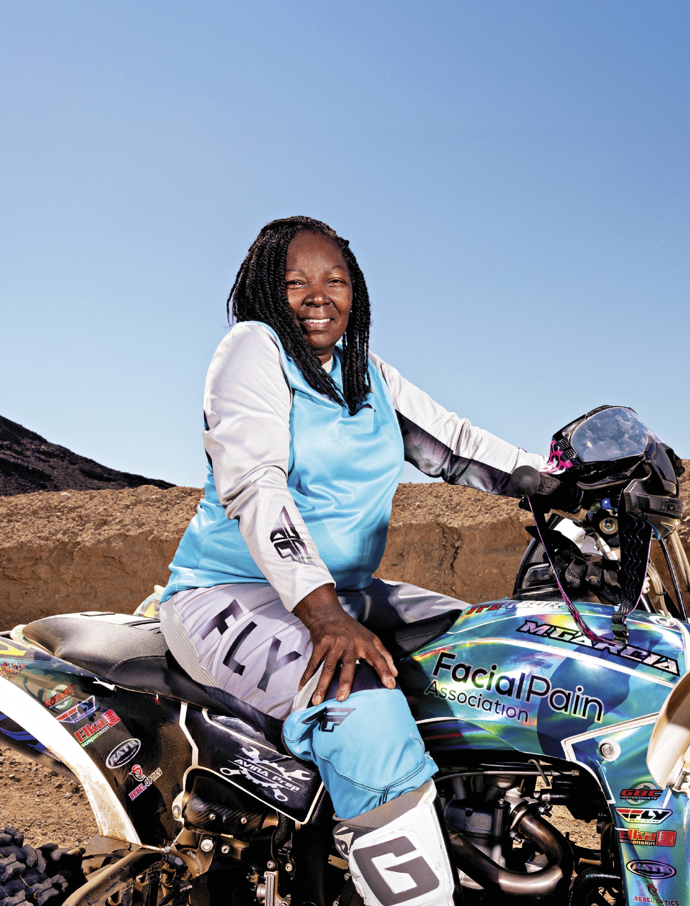 Photograph of Marsha Garcia sitting on her ATV