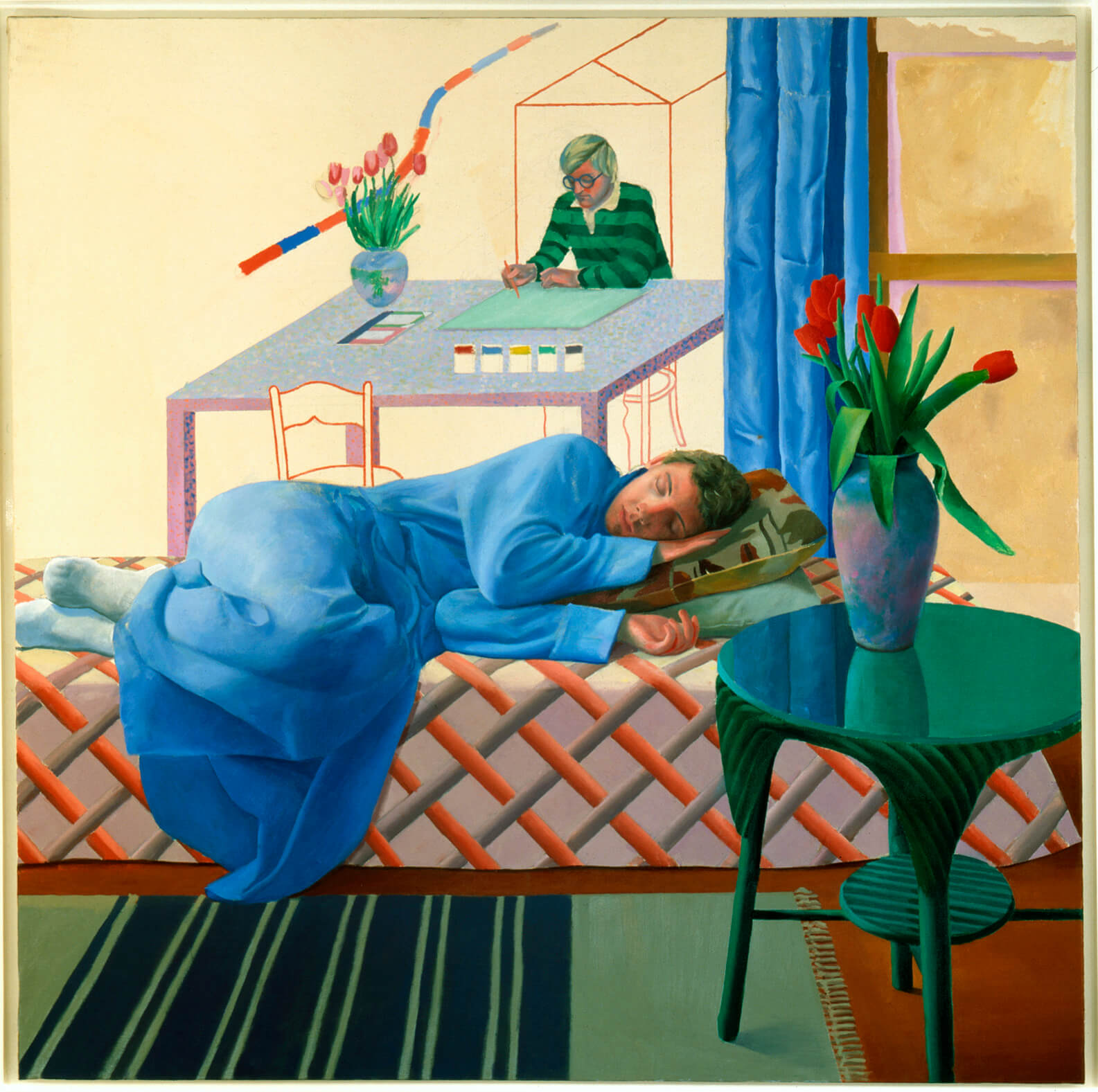 Photo of an unfinished self-portrait painting of David Hockney showing a woman lying on a bed in the foreground and David sitting at a desk in the background