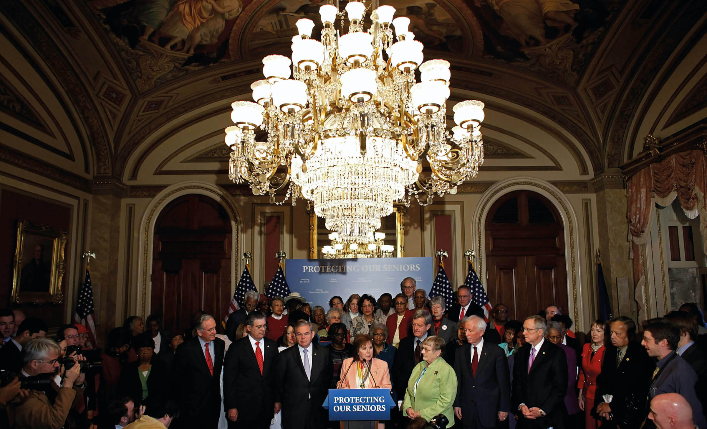 Photo of congressional leaders announcing the passage of the Affordable Care Act