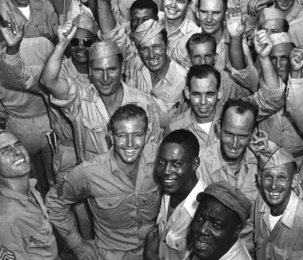 Vintage black and white photo of a large group of U.S. soldiers