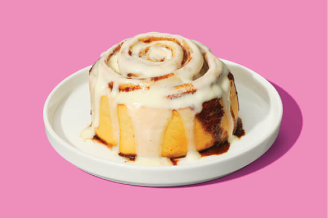 Photo of a cinnamon bun on a plate