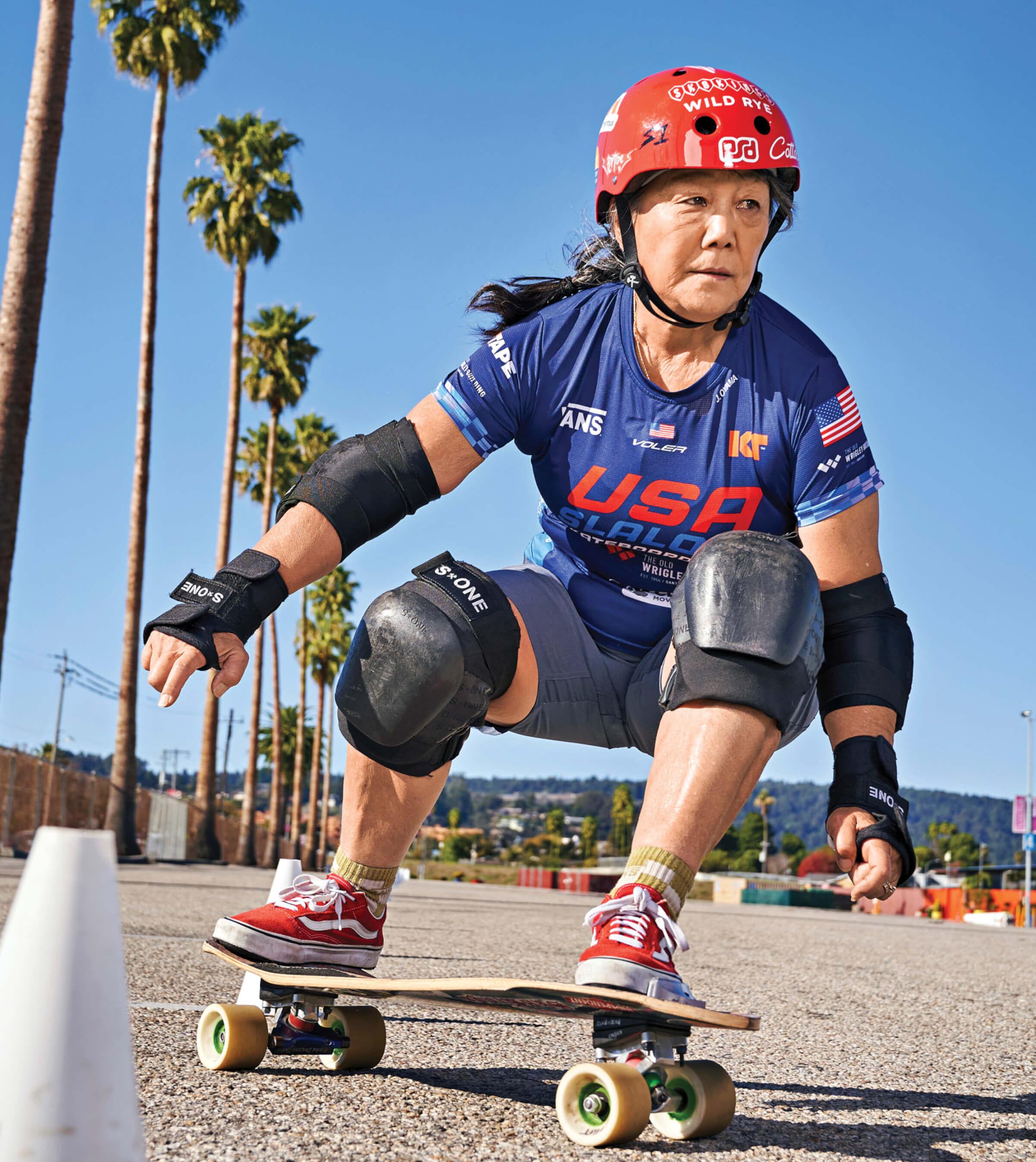 Photo of Judi Oyama riding her skateboard