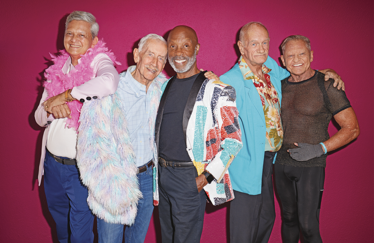 Photograph of a group of older men wearing colorful and eclectic clothing