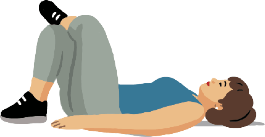 Woman lying on her back, hands under her lower back and palms down