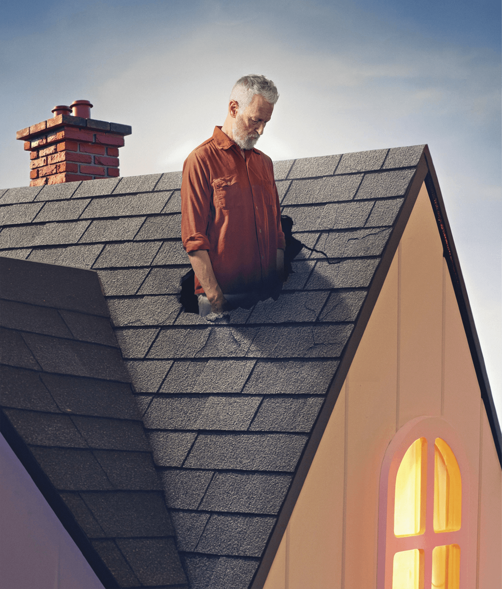 Man standing in a hole in his roof staring at it in disappointment&nbsp;