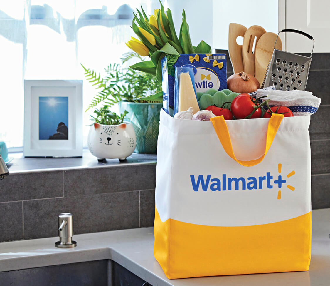 Photo of Walmart grocery tote on kitchen counter, full of produce