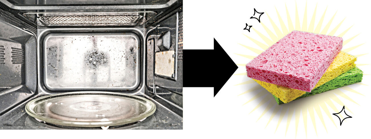 Photo of inside of microwave, arrow pointing to stack of sponges