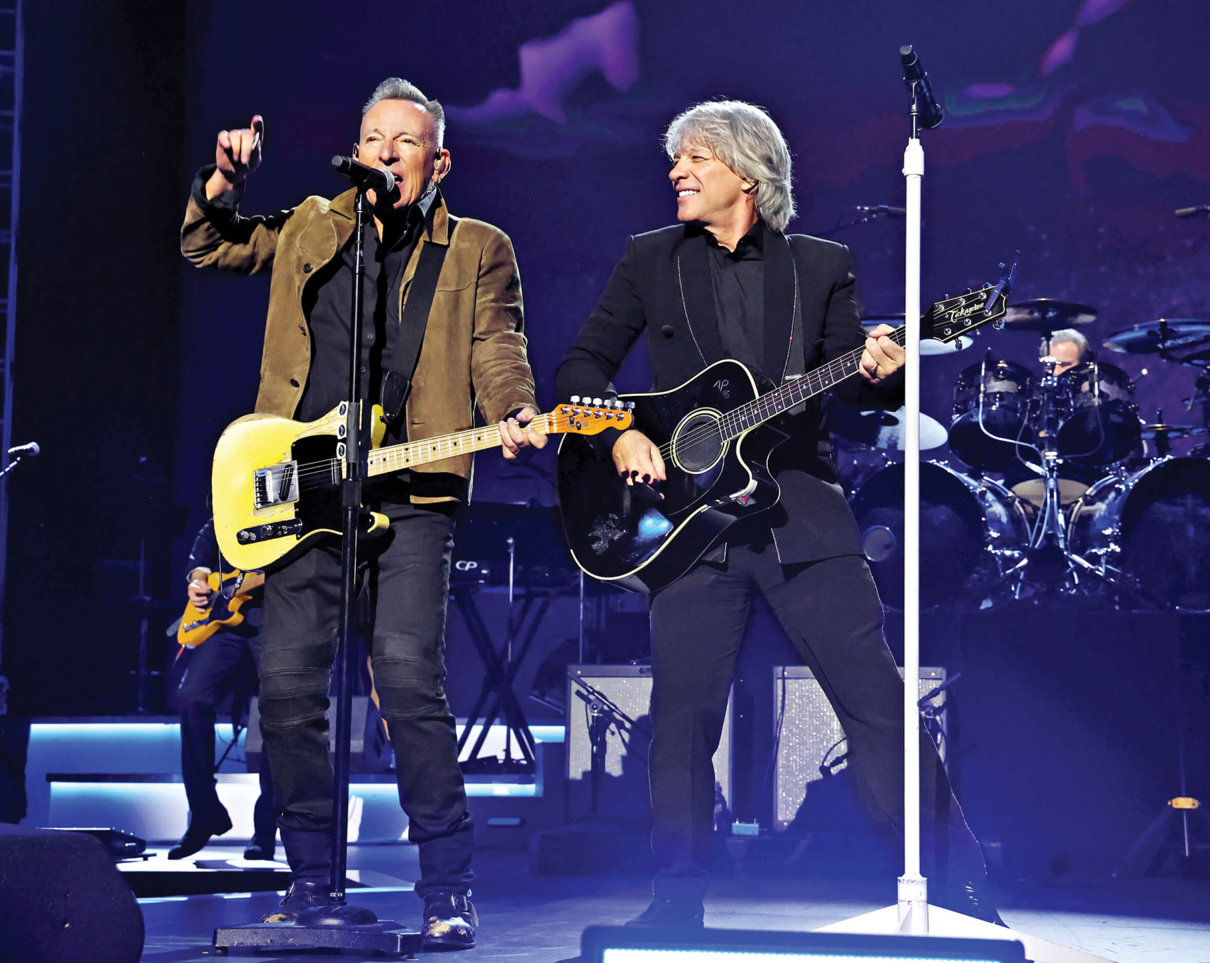 Photos of Bon Jovi performing with Bruce Springsteen