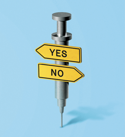 Photo of a shot needle with a YES, NO sign on it