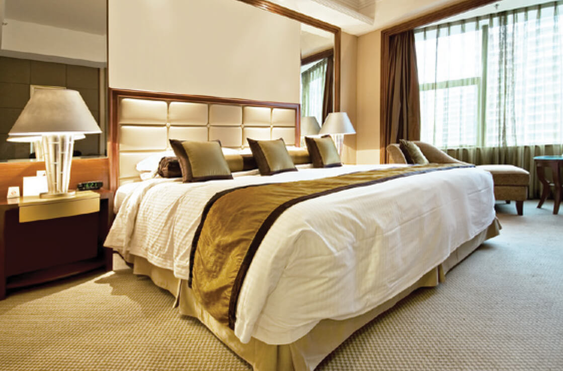 Photo of bed in hotel room