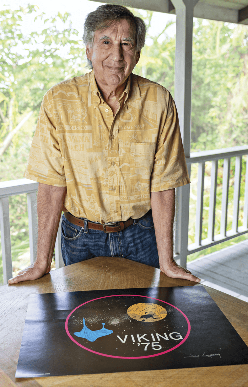 Image of artist Jon Lomberg in front of his Viking ’75 illustration in his home in Hawaii 