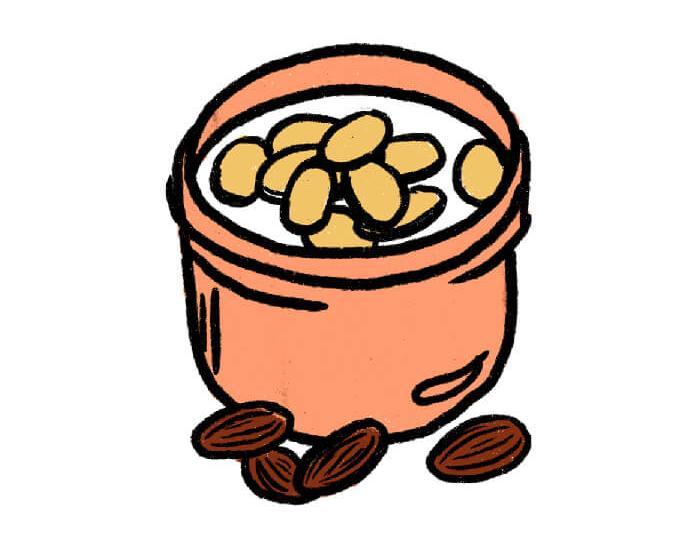 Illustration of a cup with Greek yogurt and nuts in it 