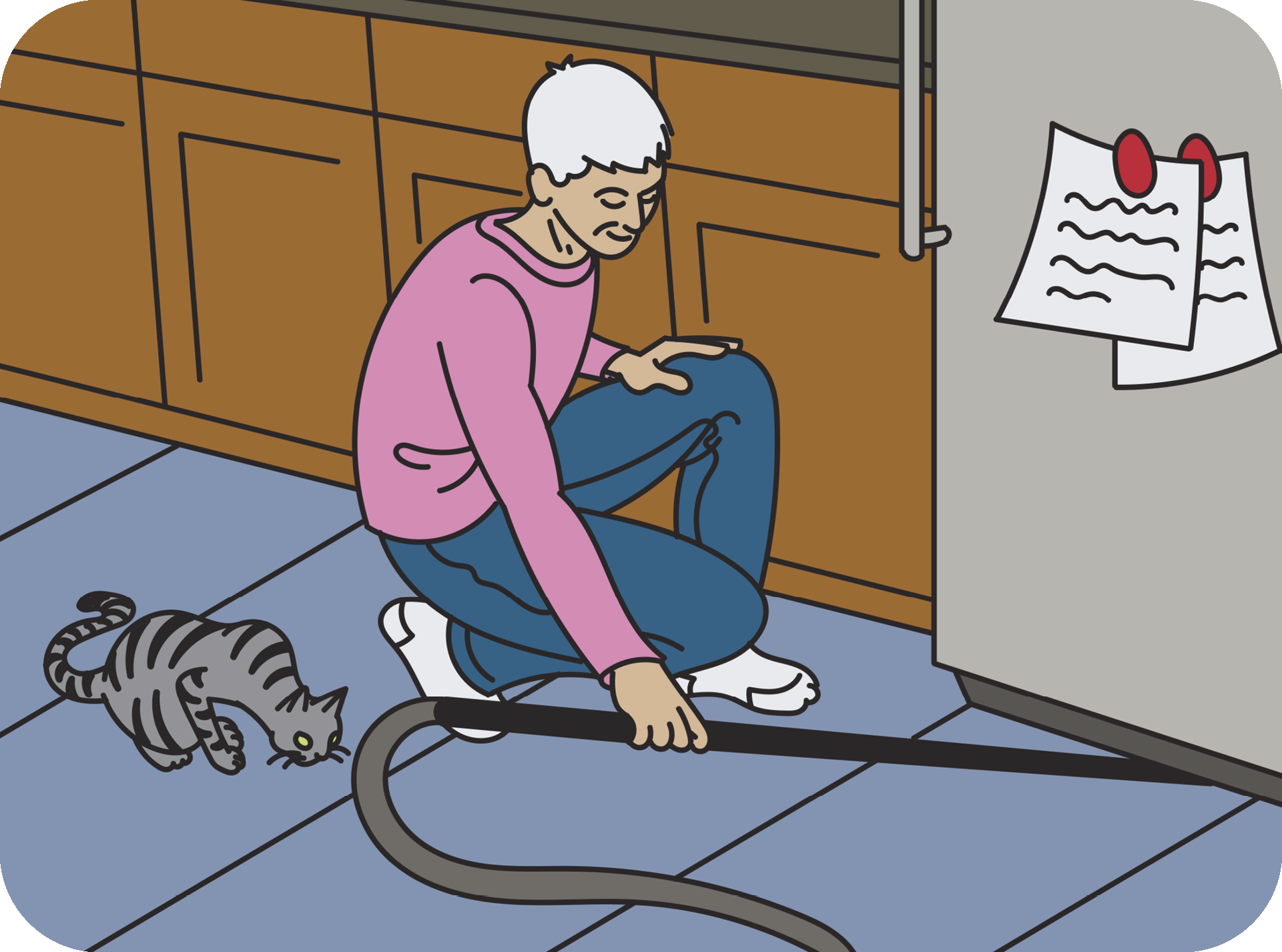 A woman crouching down and vacuuming below her refrigerator 