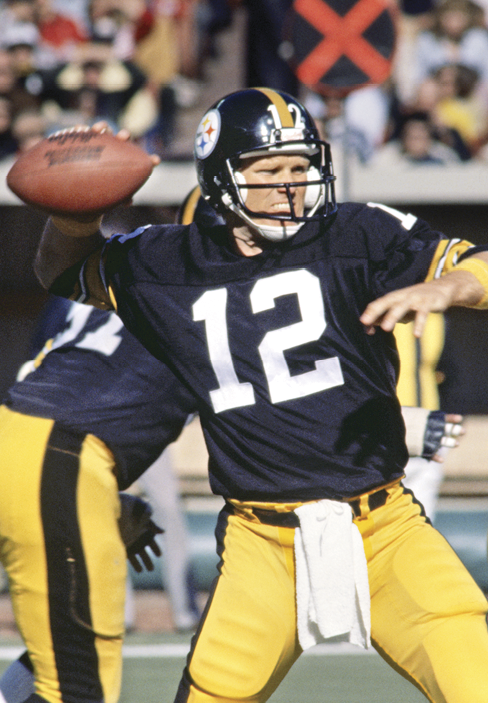 Photograph of Steelers quarterback Bradshaw throwing the football 