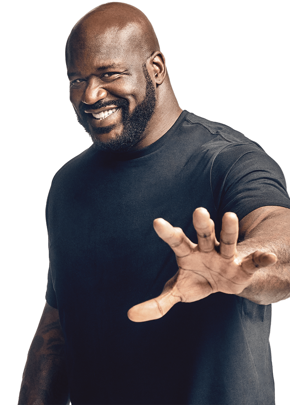 Image of Shaquille O’Neal wearing a black shirt and smiling at the camera 
