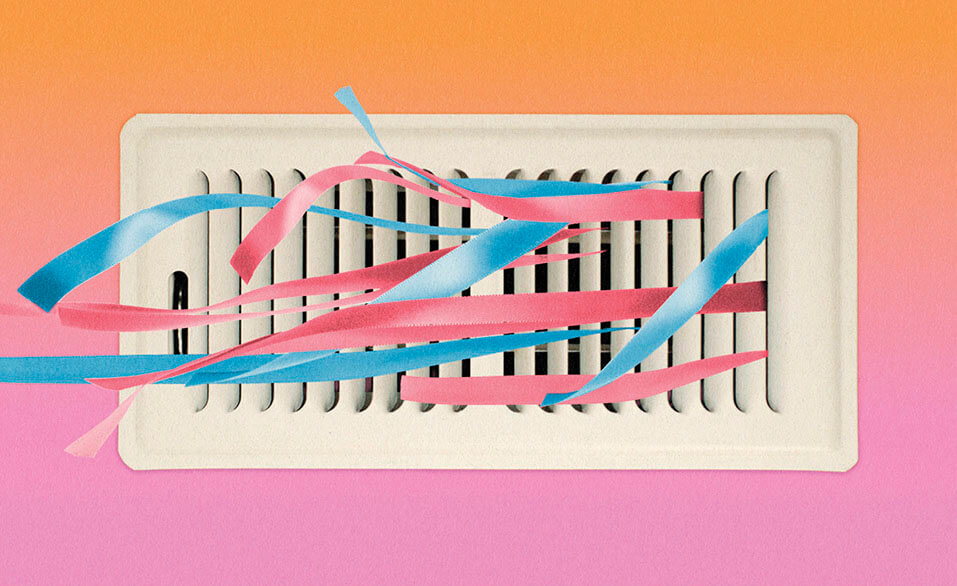 Photograph of a vent with streamers flying out of it