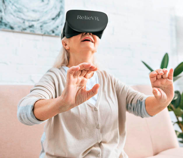 Photo of a woman wearing a virtual reality headset