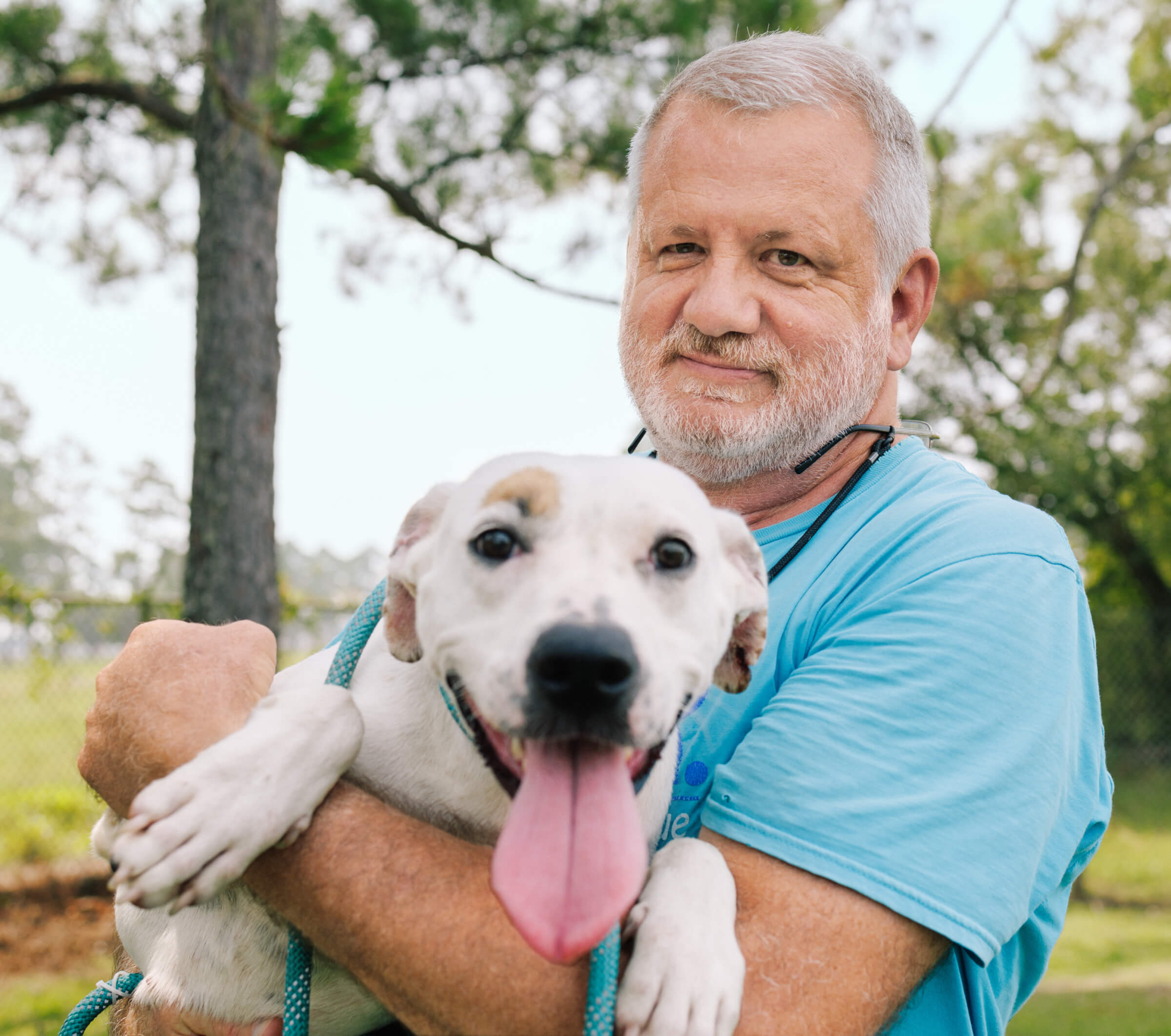 Photo of Michael Merrill with his foster pup Maggie