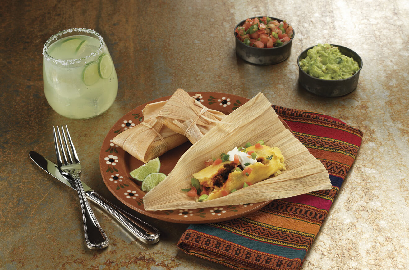 Photo of 2 tamales on a plate