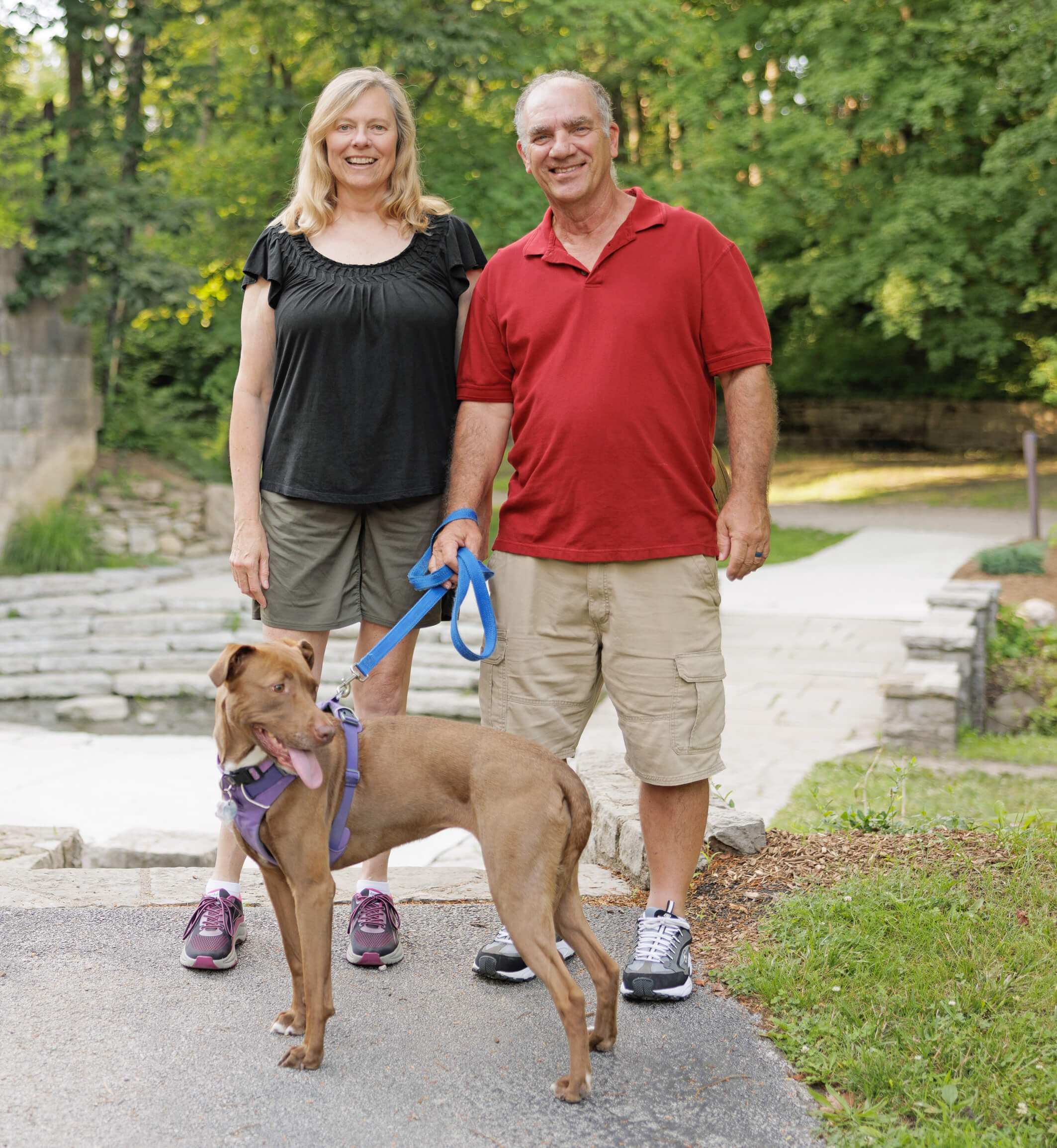 Photo of Patty Ronau-Cramer and Dave Cramer with their dog