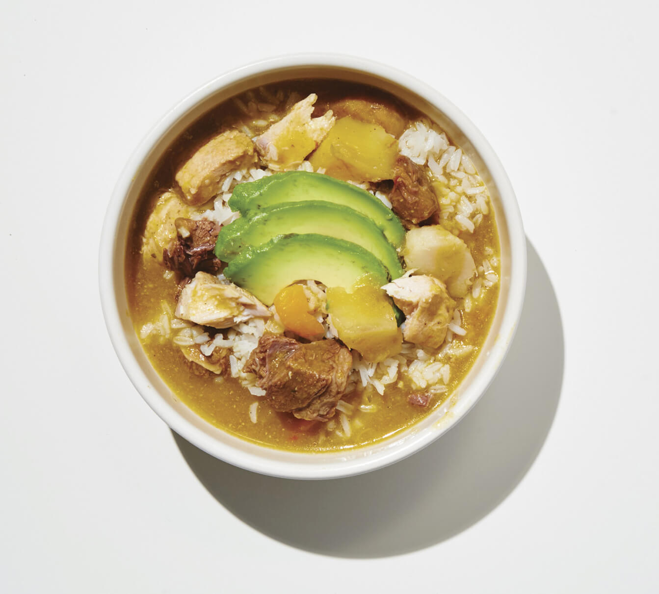 Photo of a bowl of sancocho, a meaty stew