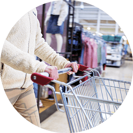 Photo of woman pushing shopping cart