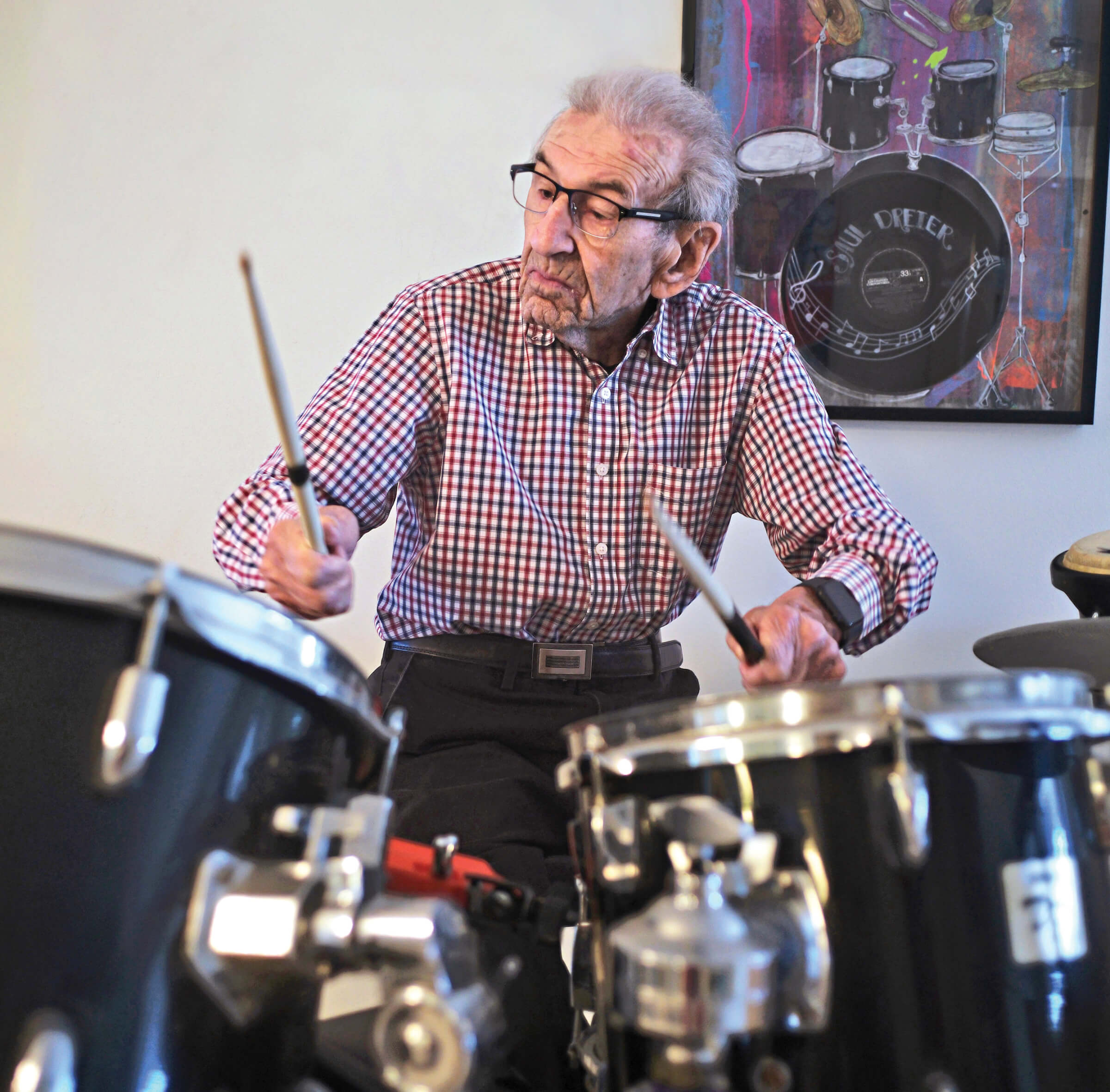 Photo of Saul Dreier playing drums